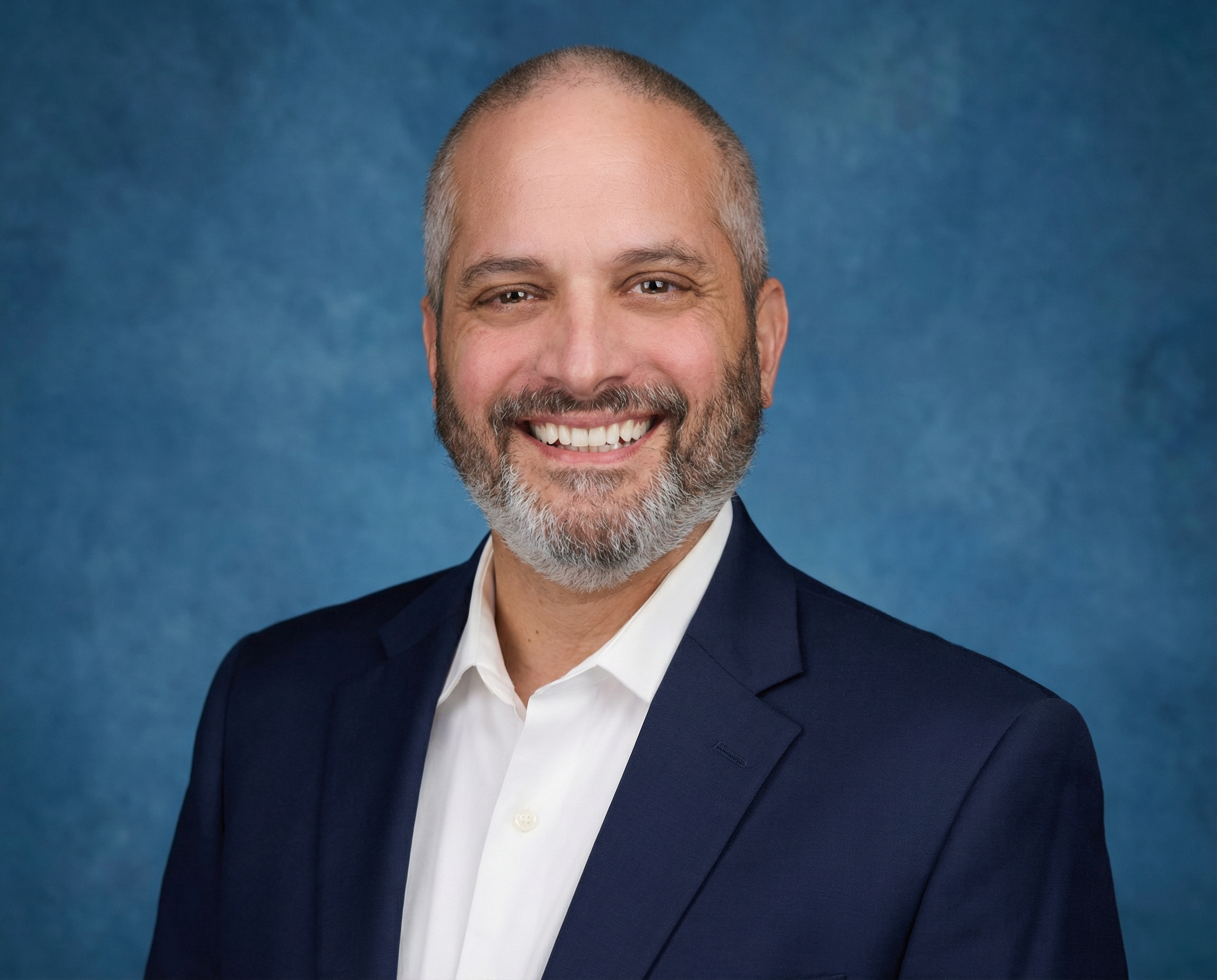 AI generated image using NANO_BANANA_PRO: Replace background with a professional canvas backdrop, blue tone, with professi...